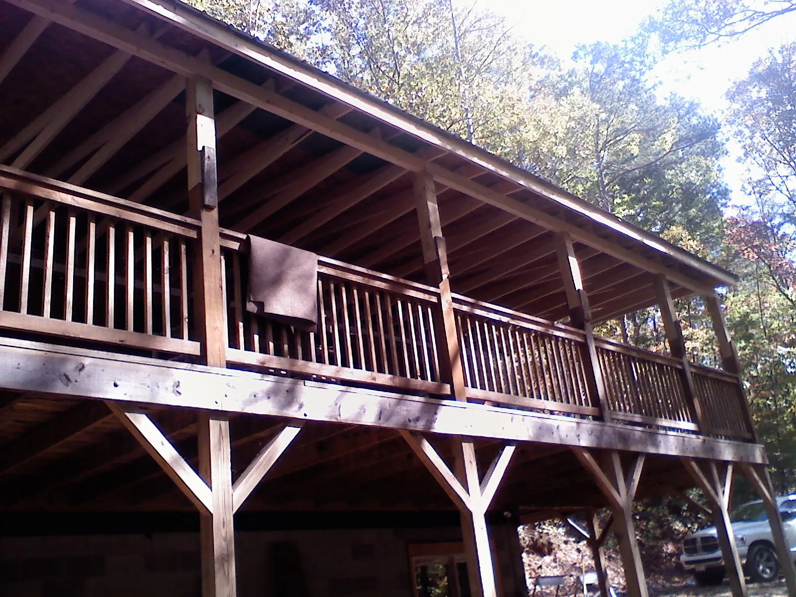 Timber framing under a new elevated porch and deck — Roof Leak Repair in Youngtown by Roofing Brothers